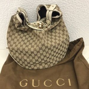 Gucci hobo bag with GG logo. Dust bag included.